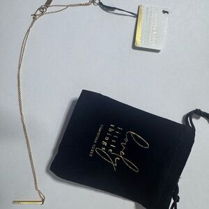 Christina Gold and Black Jewelry Tag